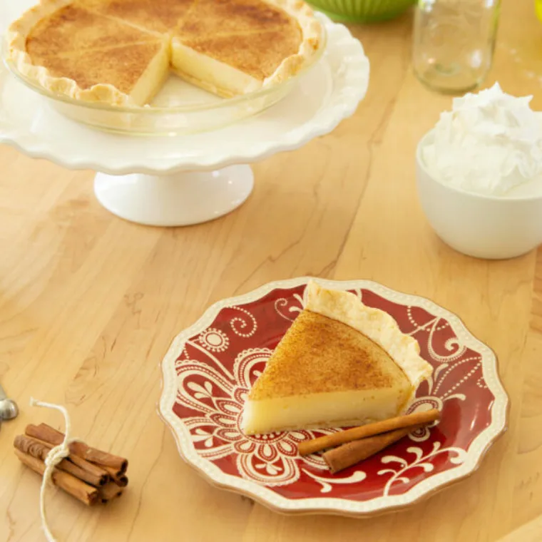 Slice of sugar cream pie with a flaky crust